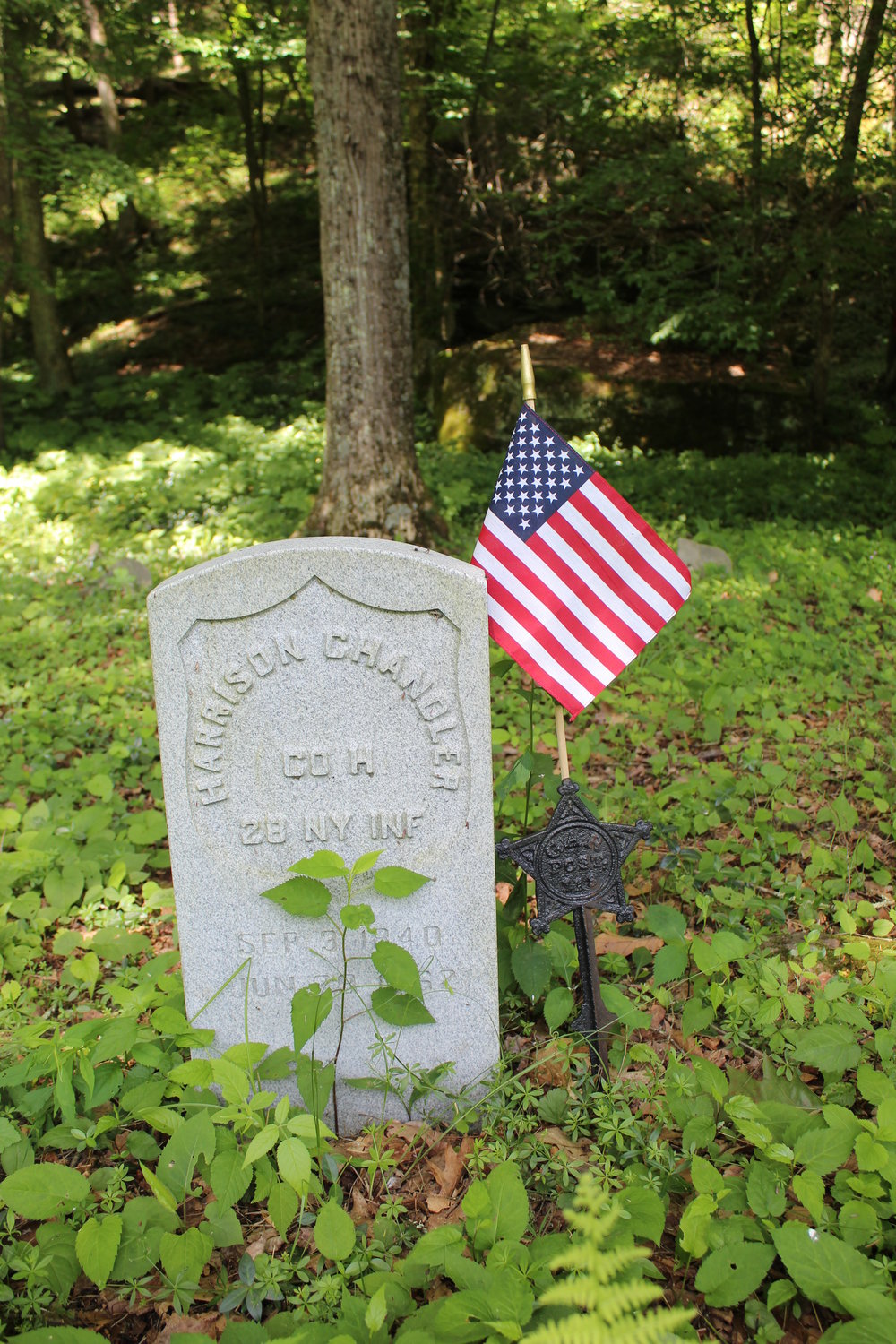 Harrison Chandler died of typhoid fever in a Confederate hospital. He and his brother, John, were both buried in unmarked graves in a cemetery near Rock Valley, NY. A century and a half later, they both received headstones from the Veterans Administration, and in 2018, a ceremony saw their final resting places marked. Pictured here is Harrison Chandler's new marker.